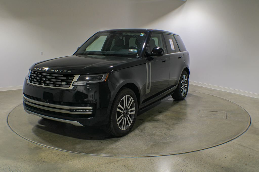 Used 2024 Santorini Black Metallic Land Rover SE image 1