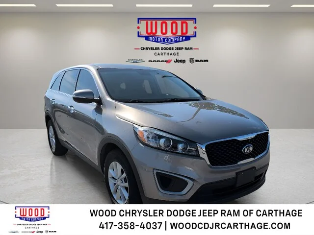 Used 2017 Titanium Silver Kia L image 1