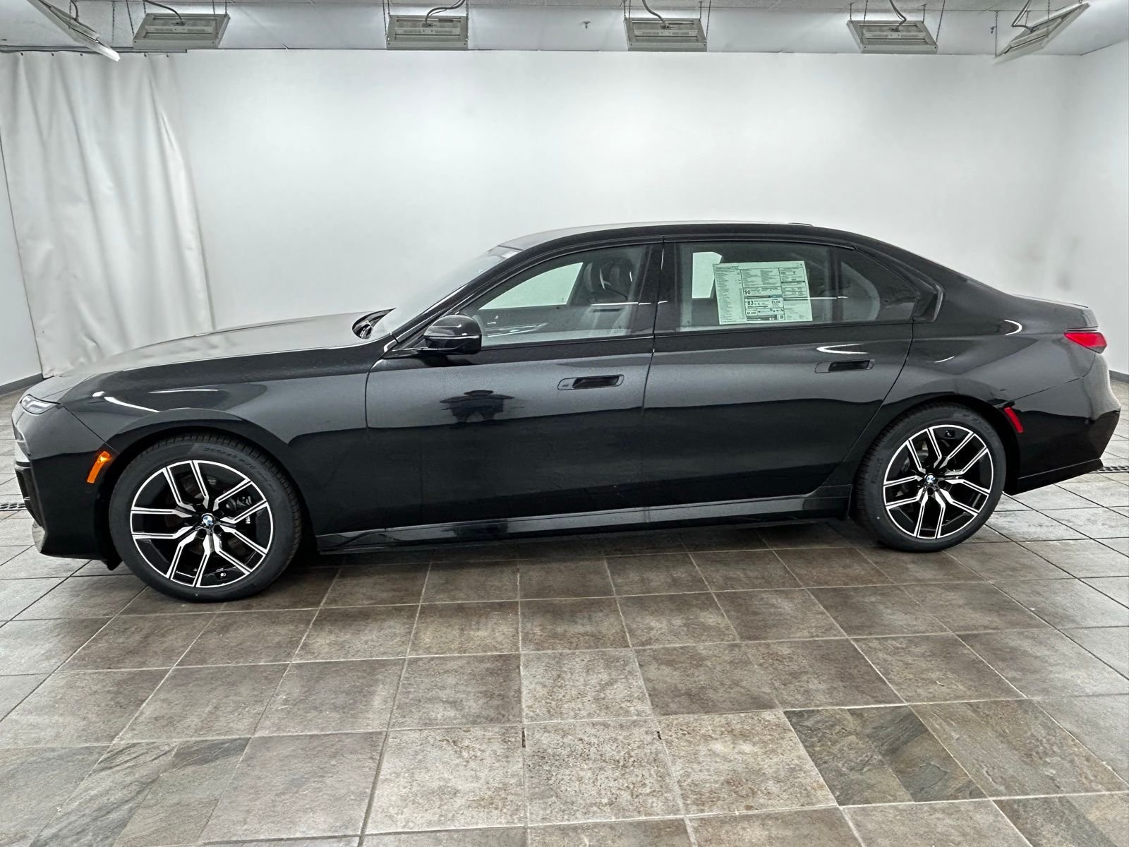 New 2026 Black Sapphire Metallic BMW xDrive60 image 2