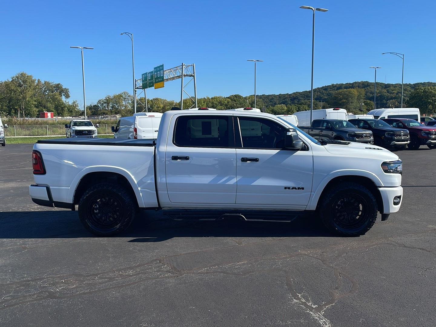 Used 2025 Ivory White Ram Laramie image 6