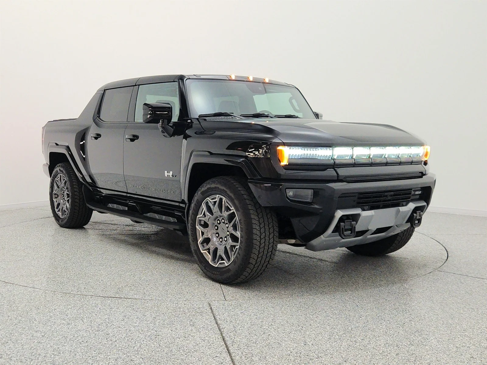 Used 2025 Void Black GMC e4WD Crew Cab 3X image 3