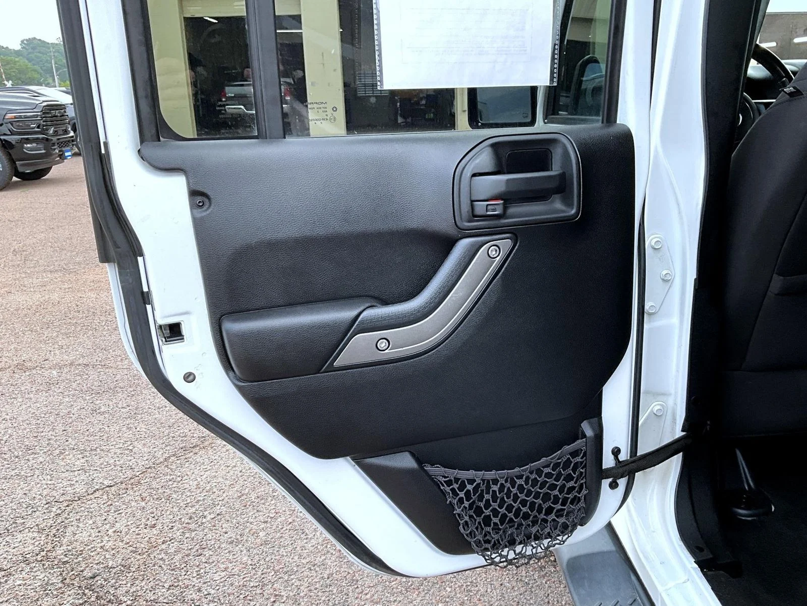 Used 2013 White Jeep Unlimited Sport image 21