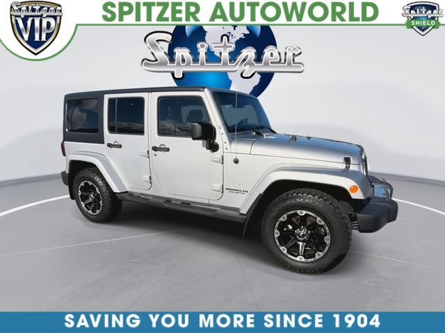 Used 2011 Silver Jeep Sahara image 2