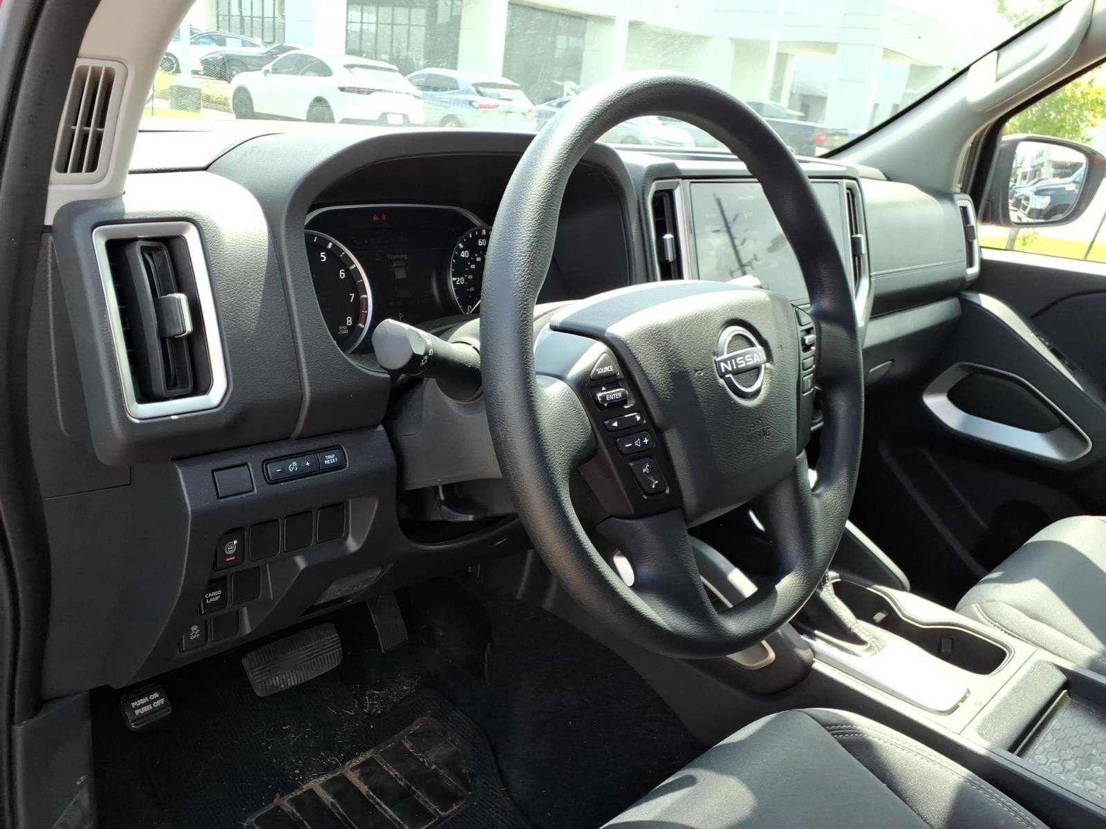 2026 Nissan Frontier SV Red at Robbins Nissan