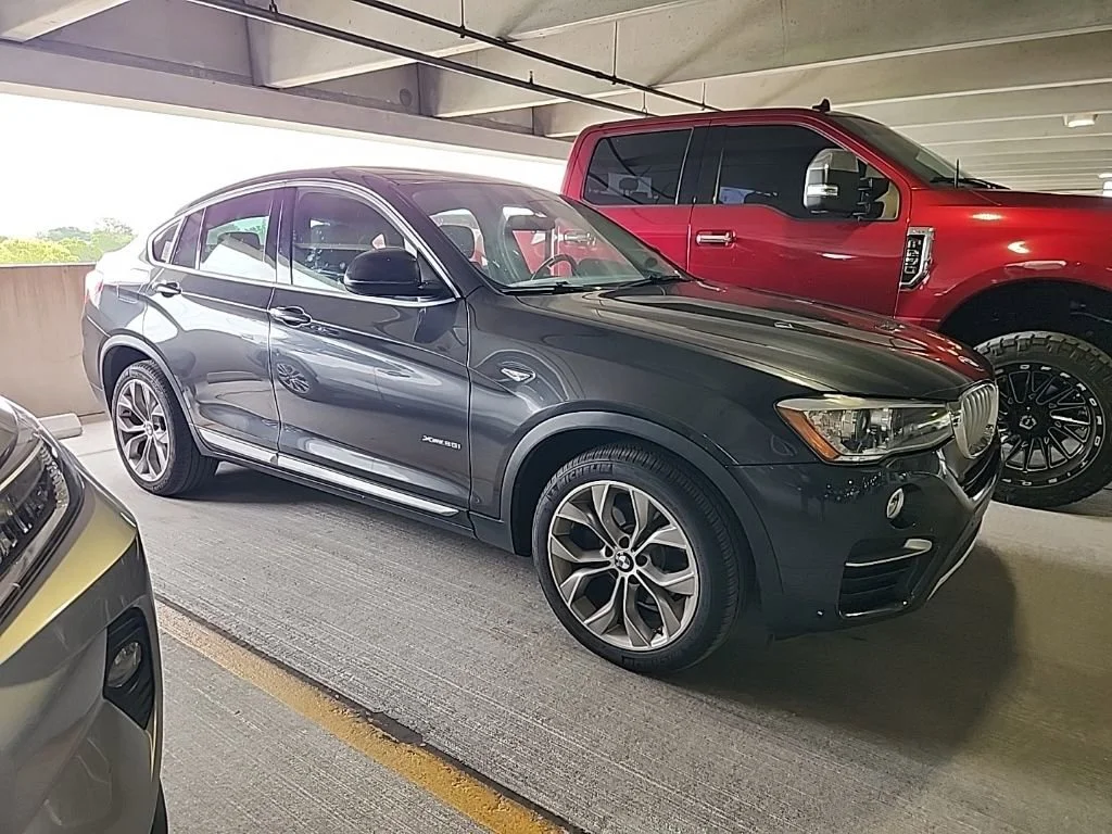 Used 2017 Dark Graphite Metallic BMW xDrive28i image 1