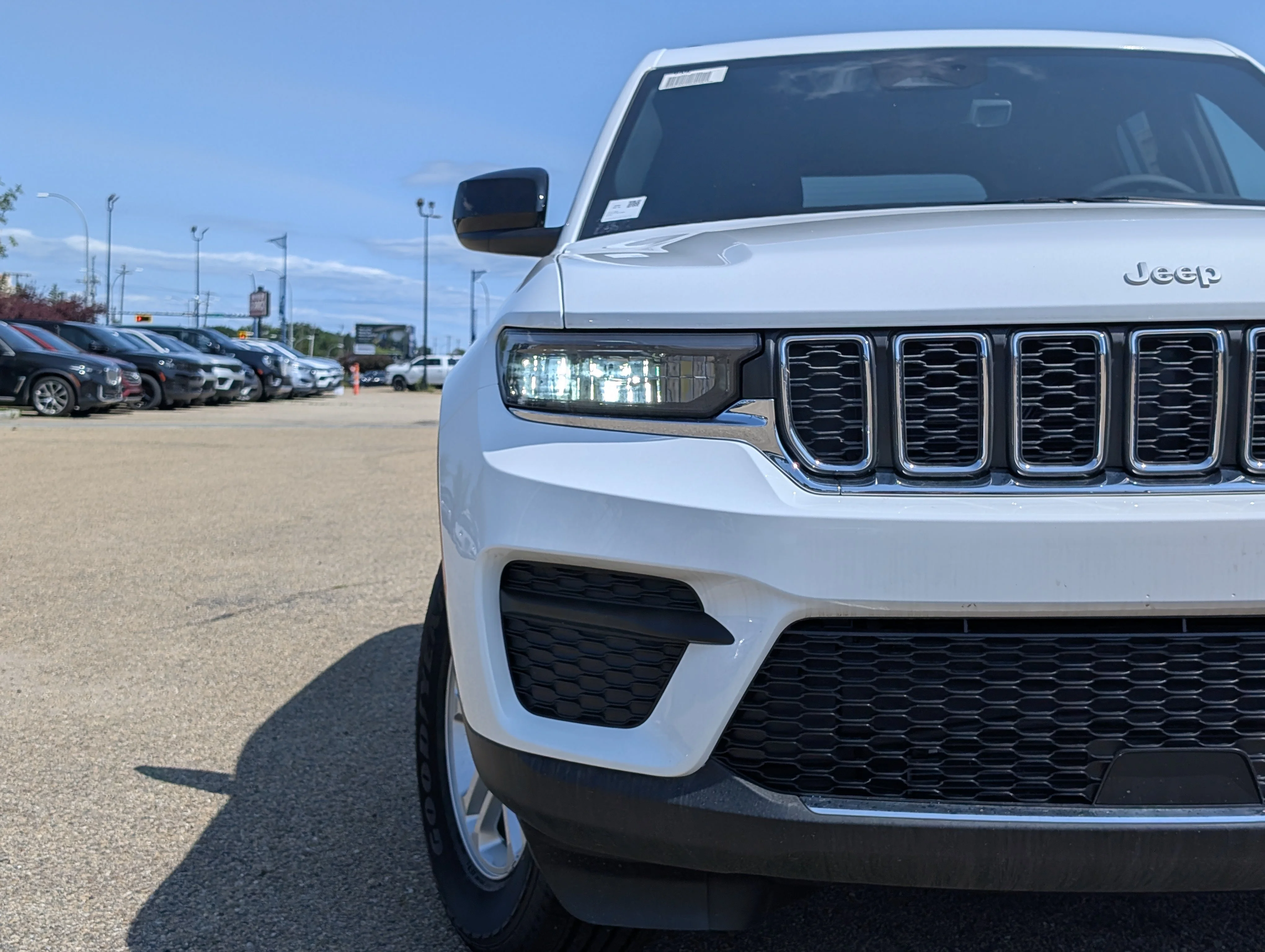 New 2025 Bright White Jeep Laredo image 11