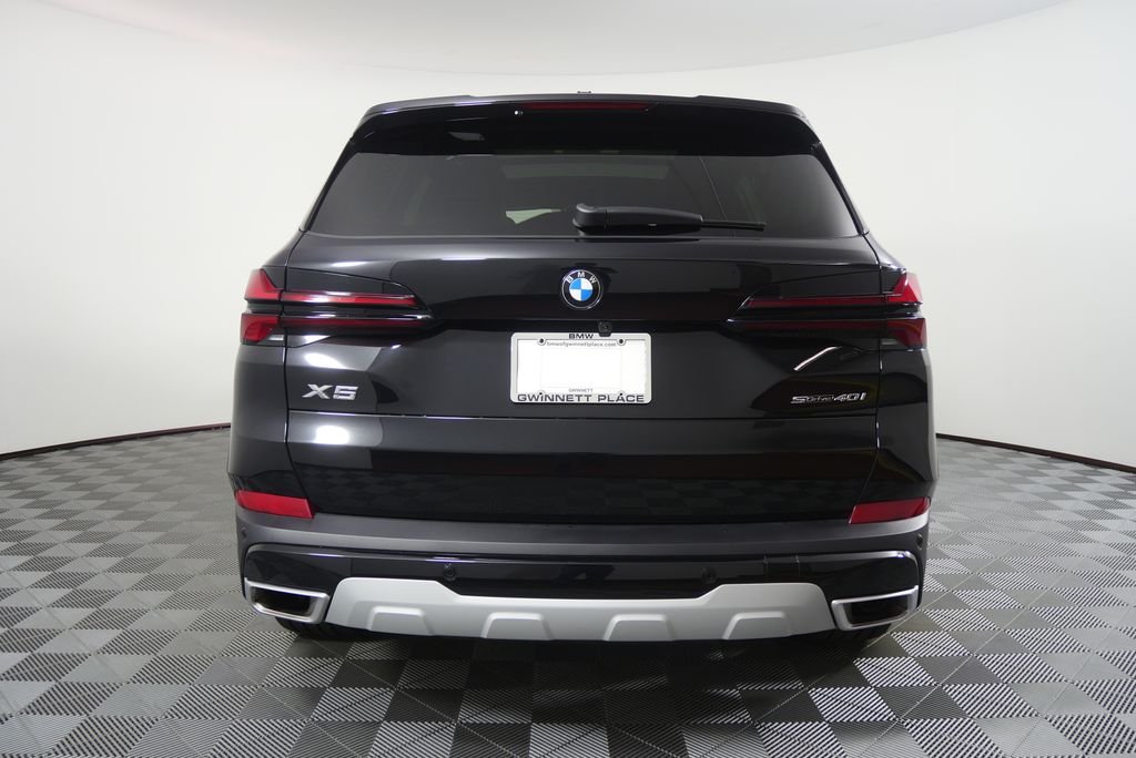 Certified Used 2026 Black Sapphire Metallic BMW sDrive40i image 4
