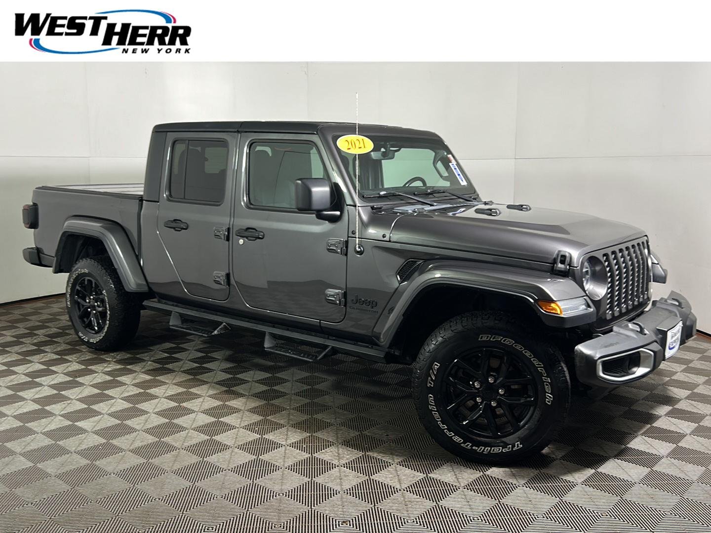 Used 2021 Granite Crystal Metallic Clearcoat Jeep Sport S image 1