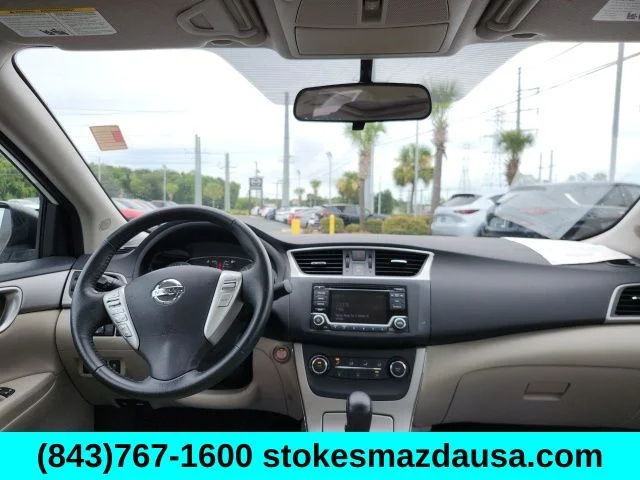 Used 2015 White Nissan SV image 1
