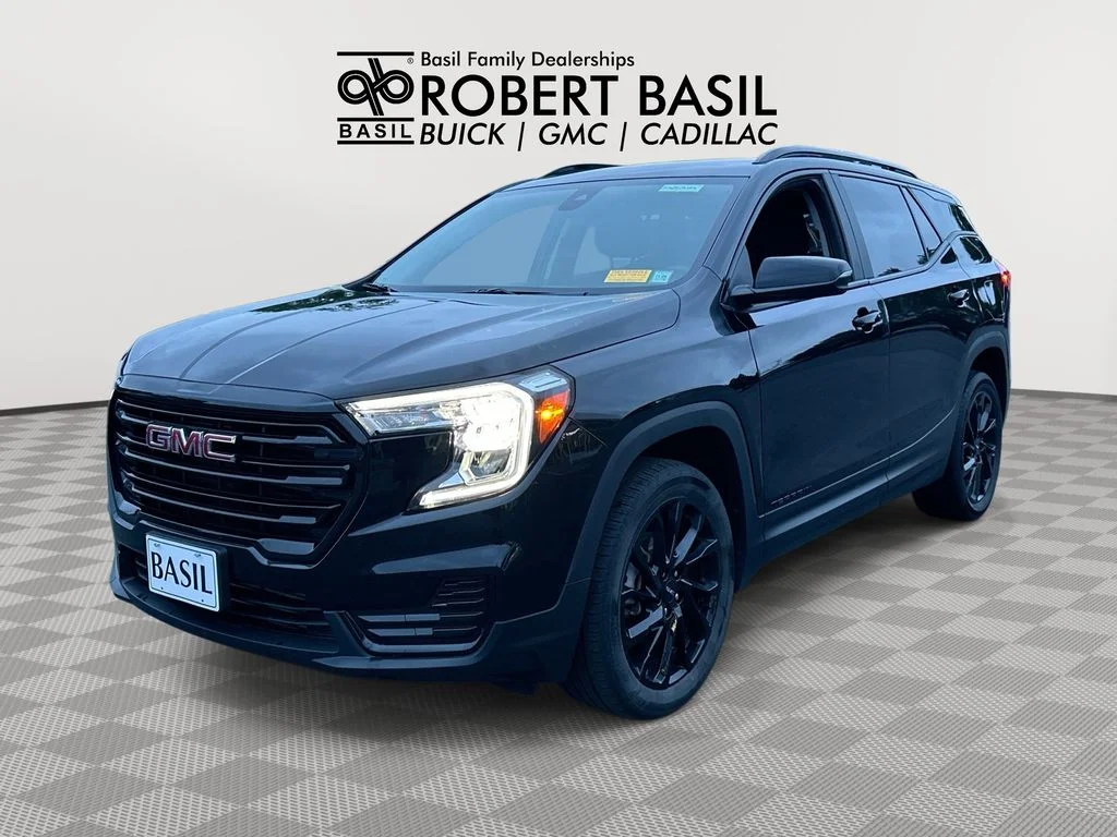 Used 2024 Black GMC SLE image 1
