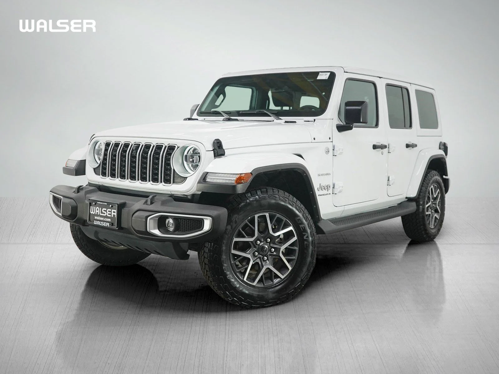 Used 2024 Bright White Clearcoat Jeep Sahara image 1