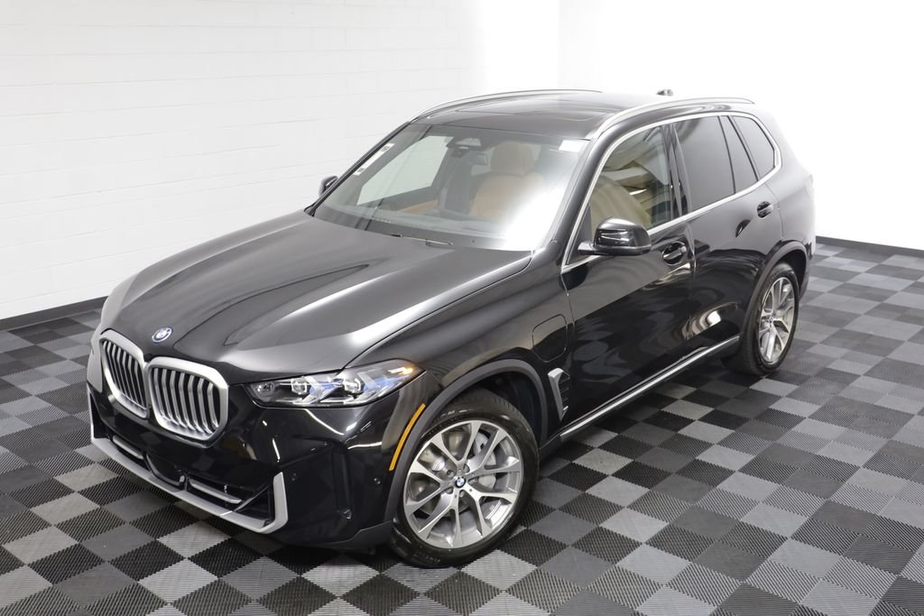 New 2026 Black Sapphire Metallic BMW xDrive50e image 2