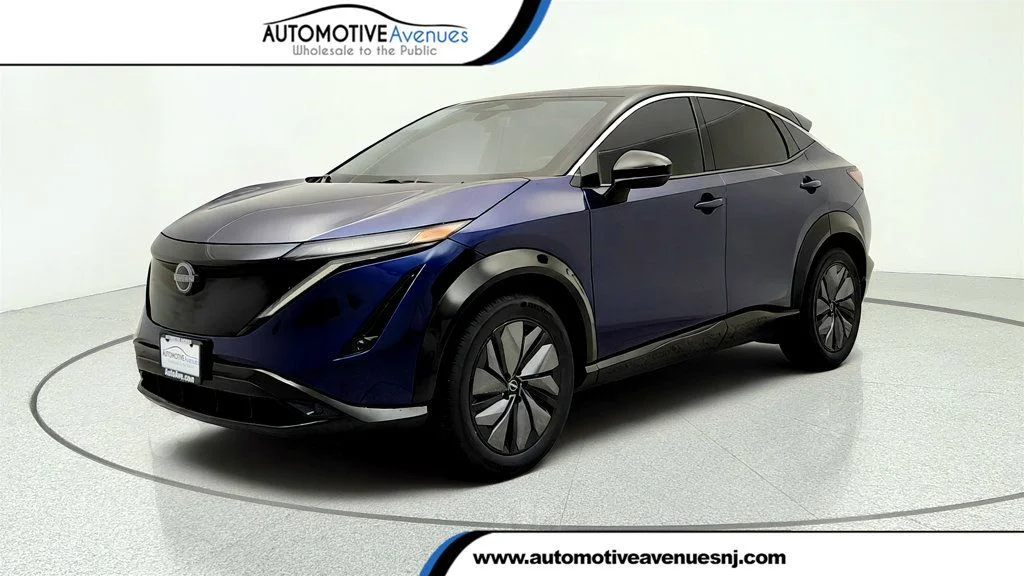 Used 2025 Deep Ocean Blue Pearl/Black Diamond Pearl Nissan EVOLVE+ FWD image 1