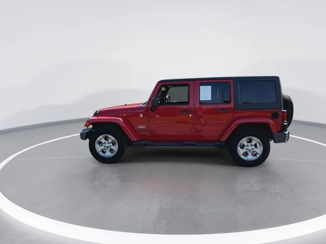 Used 2014 Red Jeep Unlimited Sahara image 6