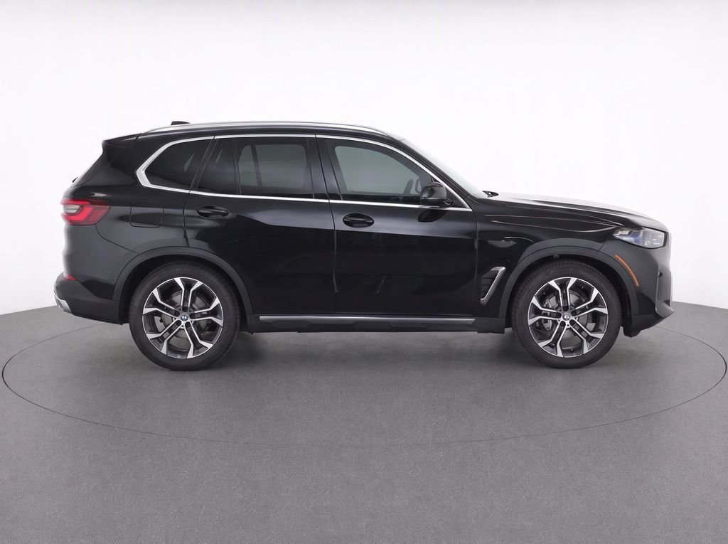 Certified Used 2026 Black Sapphire Metallic BMW sDrive40i image 2
