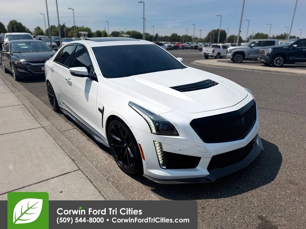 Used 2017 Crystal White Cadillac Base image 1