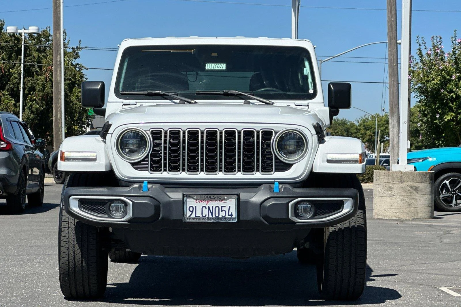 Used 2024 Bright White Clearcoat Jeep Sahara image 9