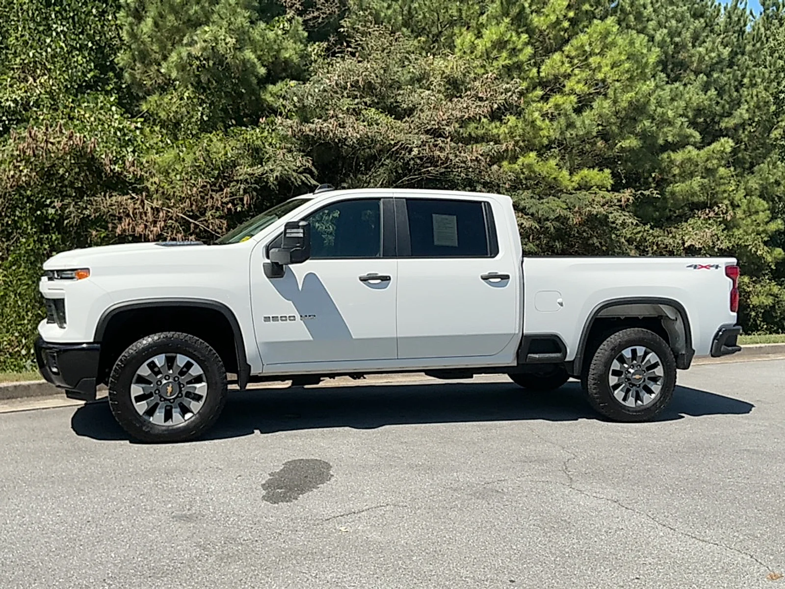 Used 2024 Summit White Chevrolet 4WD Crew Cab Standard Bed Custom image 4