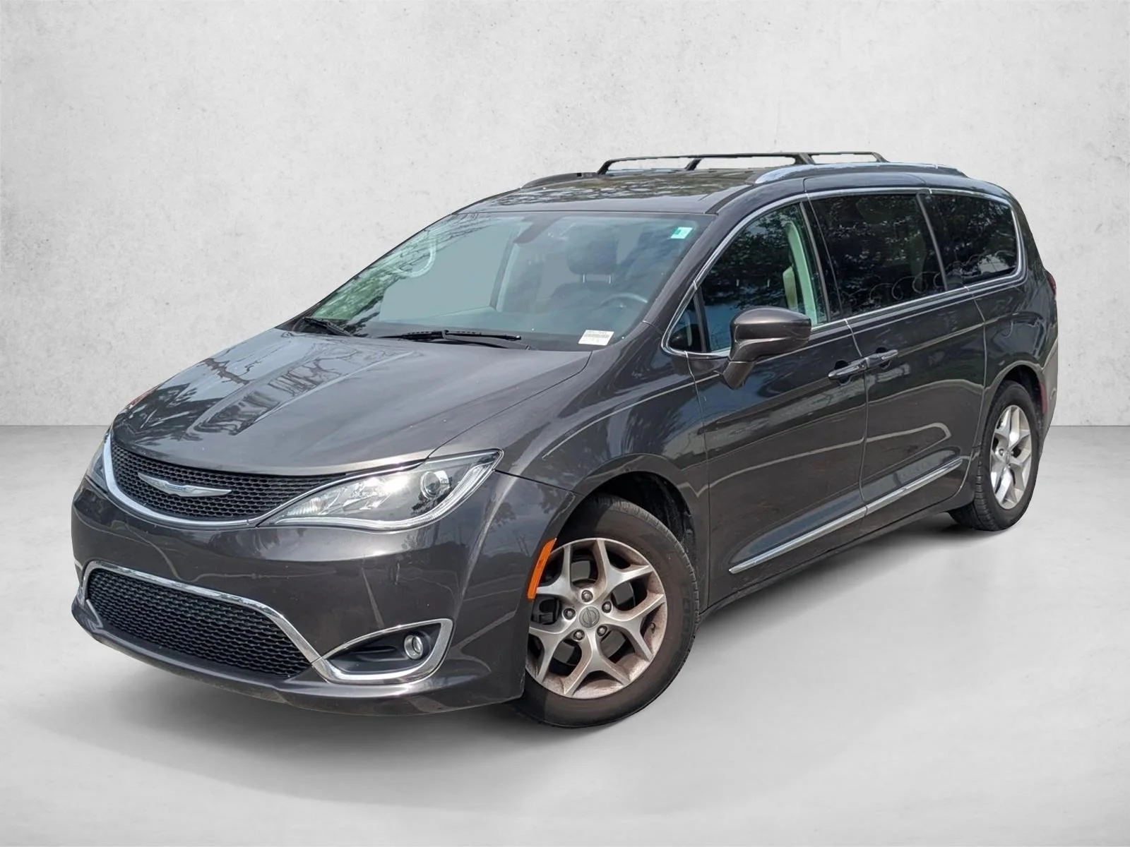 Used 2017 Granite Crystal Metallic Clearcoat Chrysler Touring-L Plus image 1