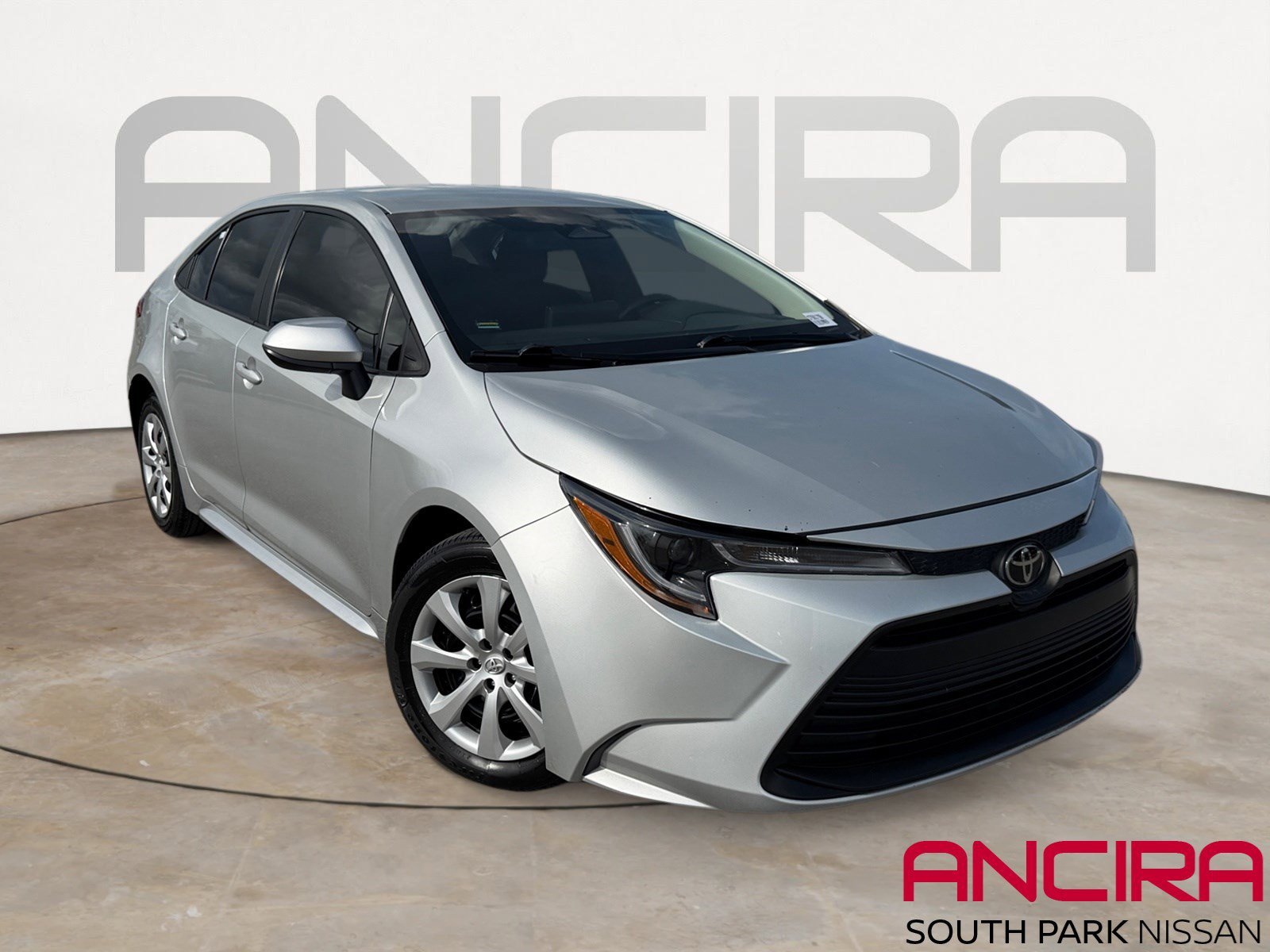 Used 2024 Classic Silver Metallic Toyota LE image 1
