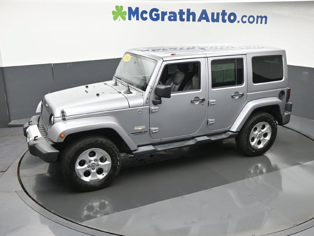 Used 2014 Gray Jeep Unlimited Sahara image 21
