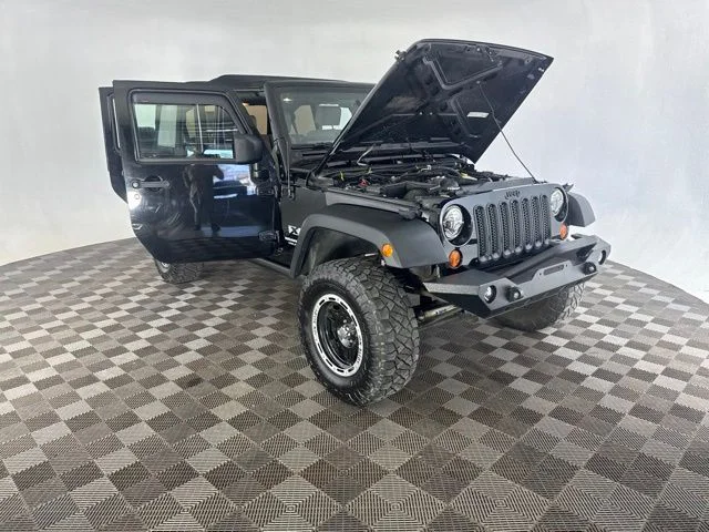 Used 2009 Black Jeep Unlimited X image 15