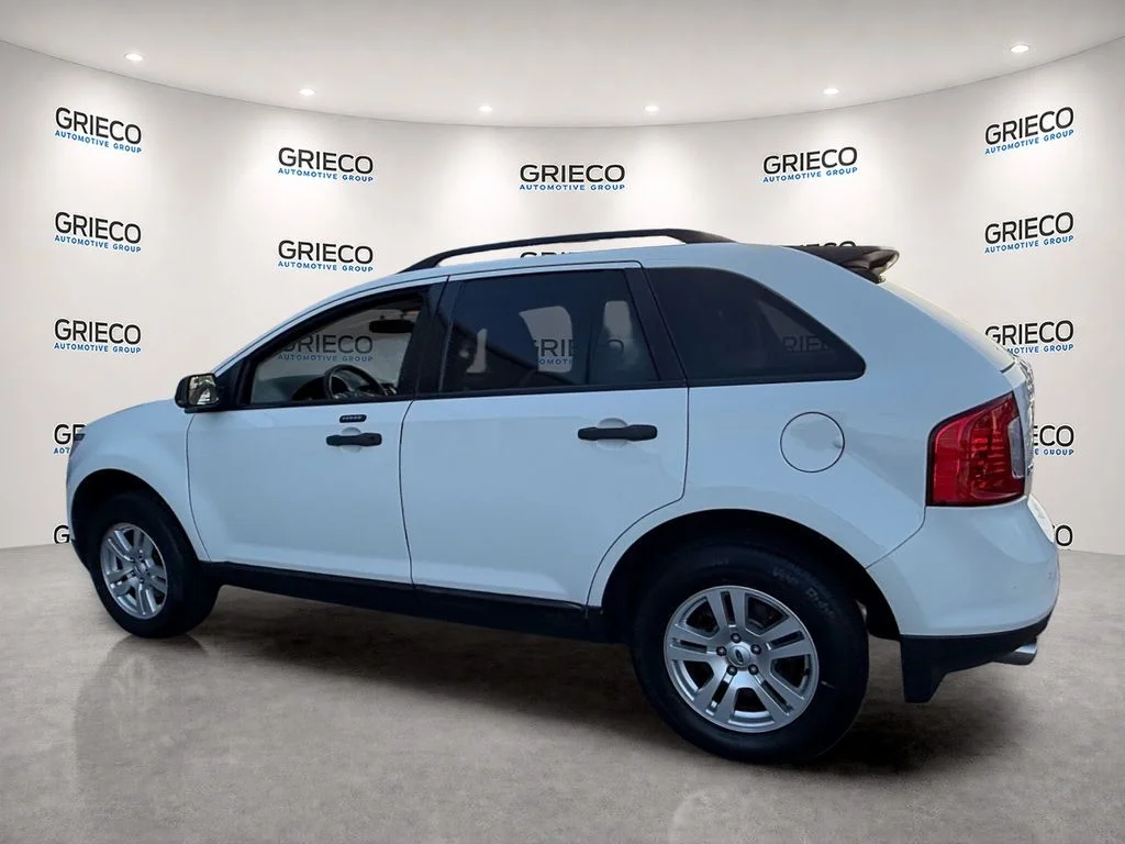Used 2011 White Suede Ford SE image 5