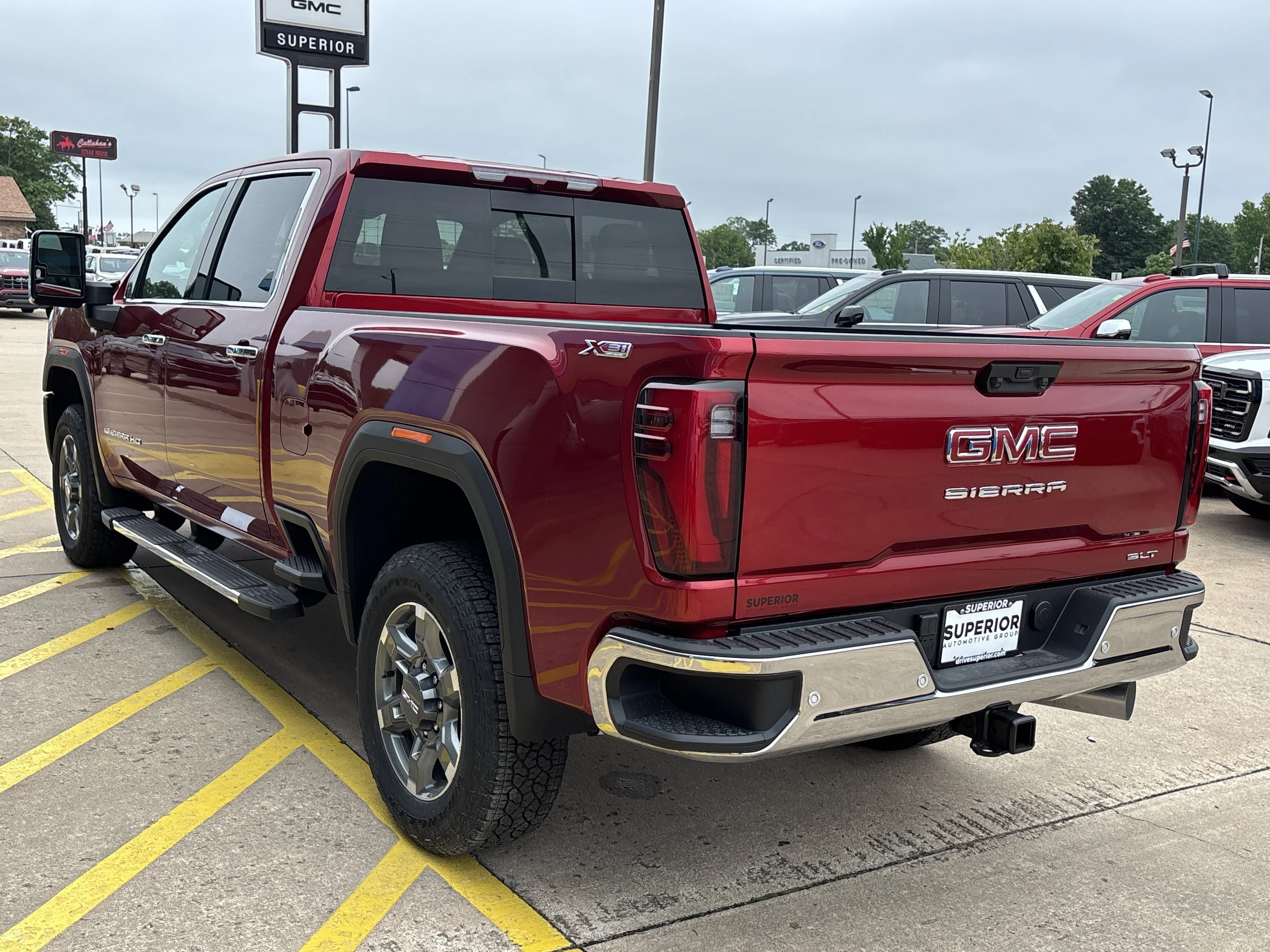 New 2026 Volcanic Red Tintcoat GMC SLT image 7