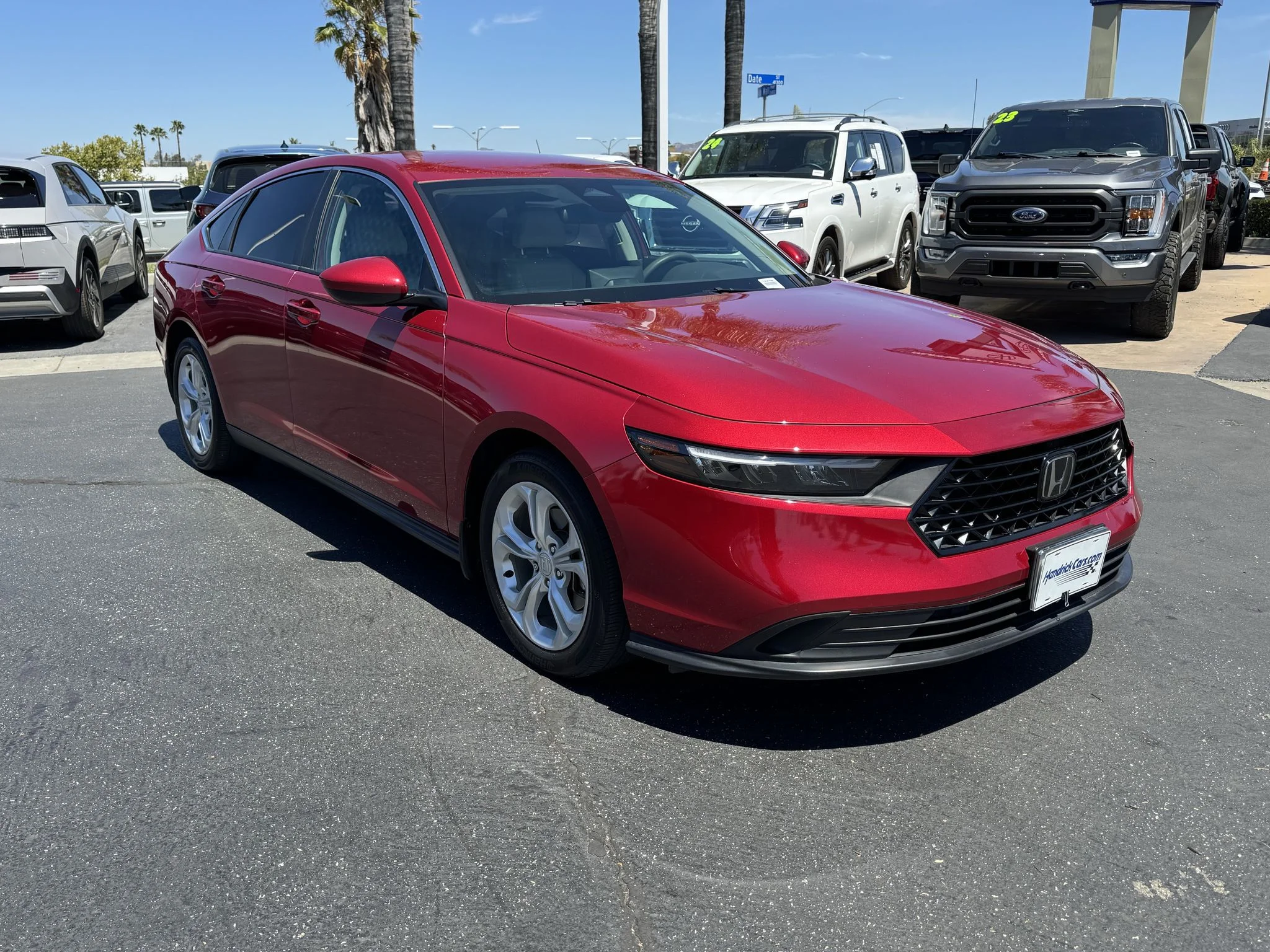Used 2023 Radiant Red Metallic Honda LX image 1
