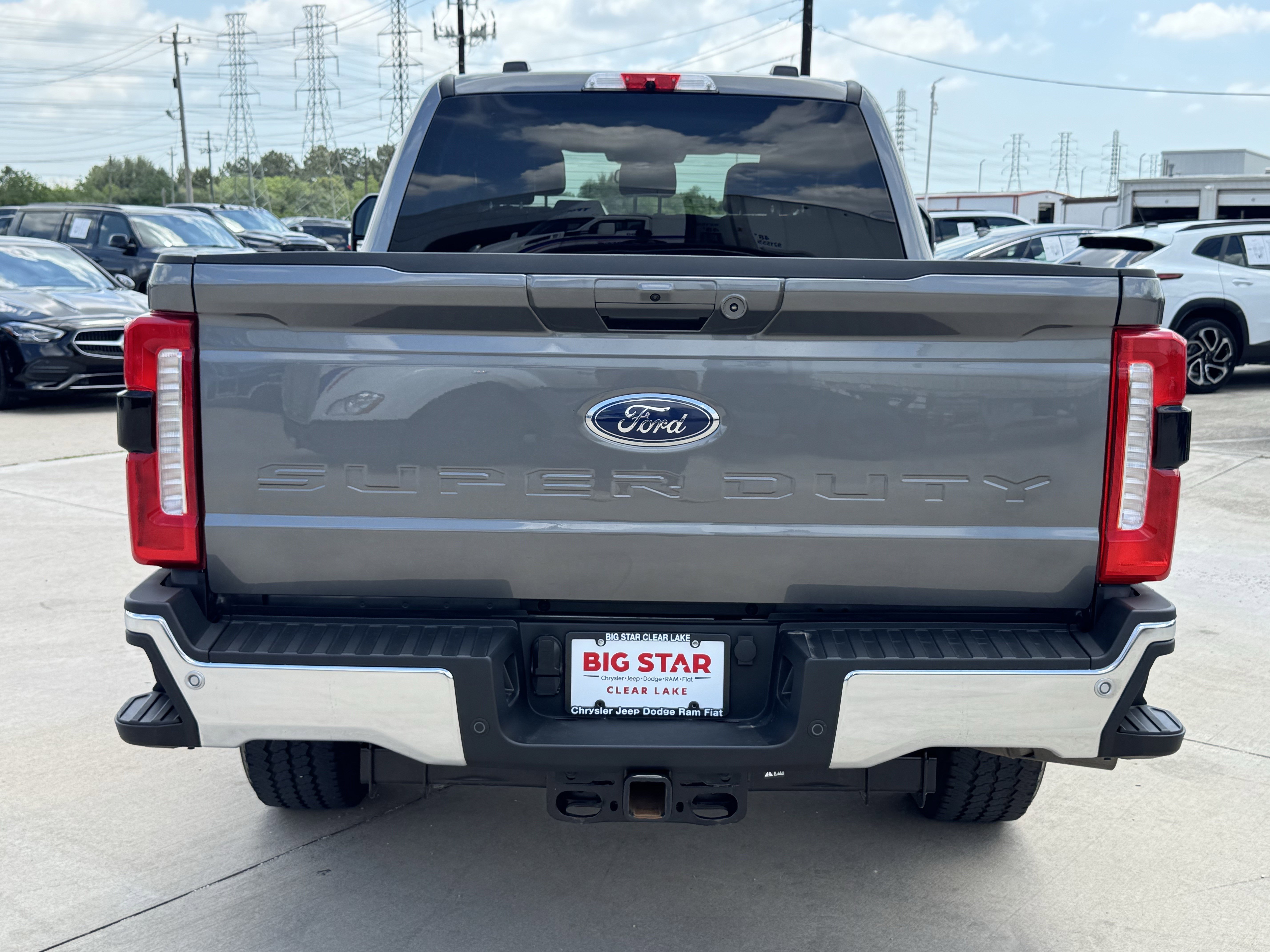Used 2025 Gray Metallic Ford LARIAT 4WD Crew Cab 6.75