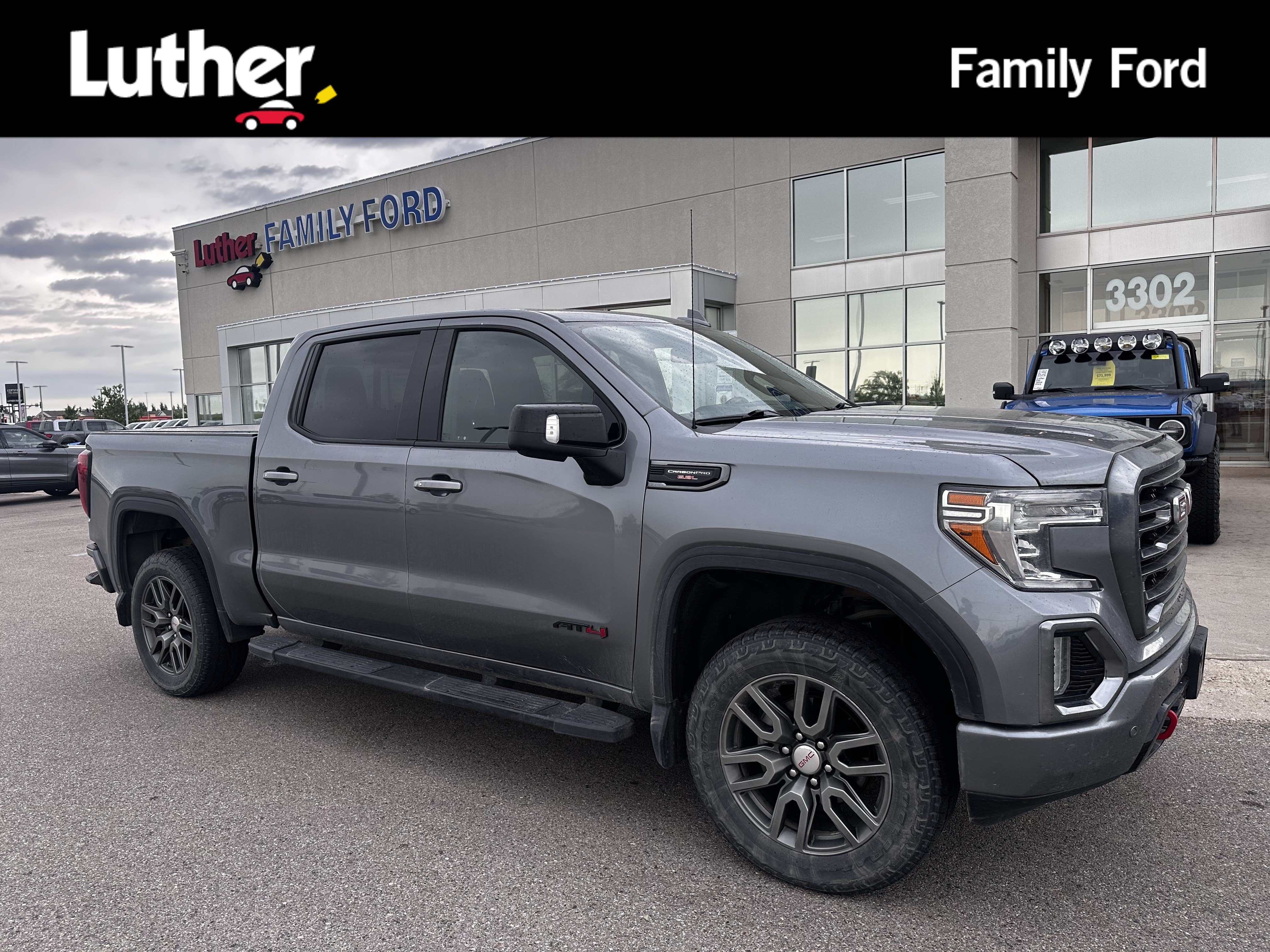 Used 2020 Satin Steel Metallic GMC AT4 image 1