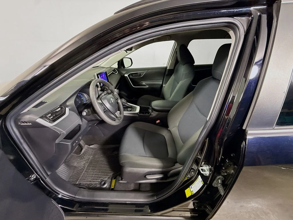 Used 2024 Midnight Black Metallic Toyota Hybrid LE image 19