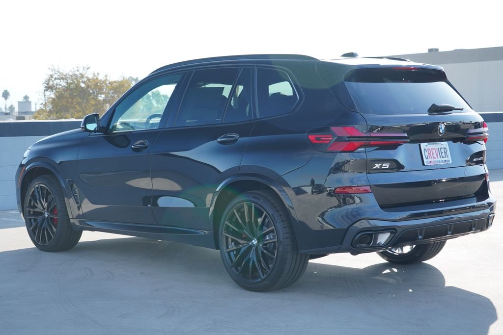New 2026 Black Sapphire Metallic BMW sDrive40i image 7