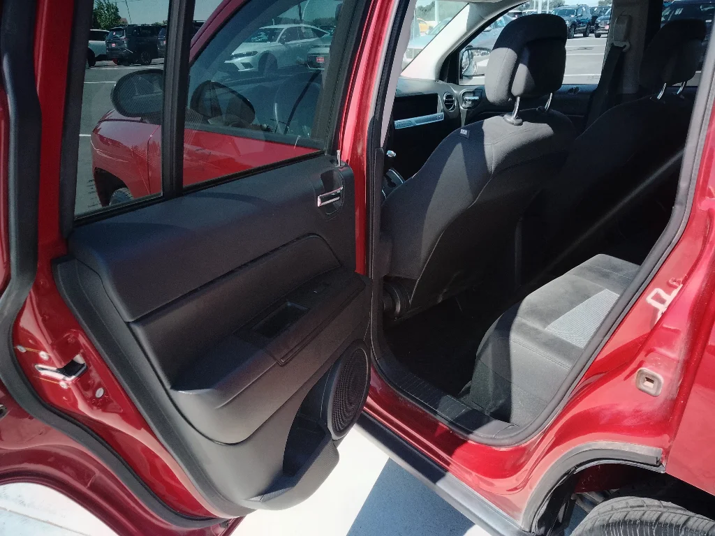 Used 2016 Deep Cherry Red Crystal Pearlcoat Jeep Sport image 9