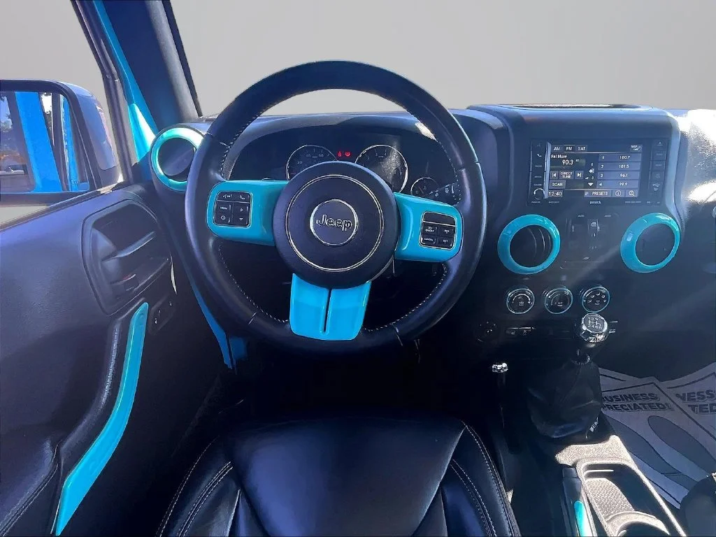 Used 2017 Blue Jeep Unlimited Sahara image 6