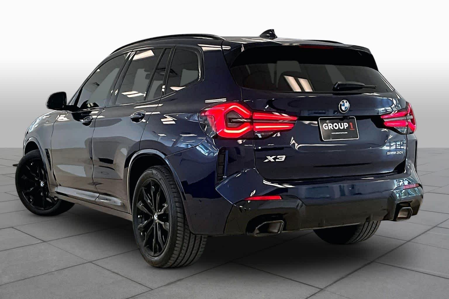 Used 2024 Tanzanite Blue II Metallic BMW sDrive30i image 11