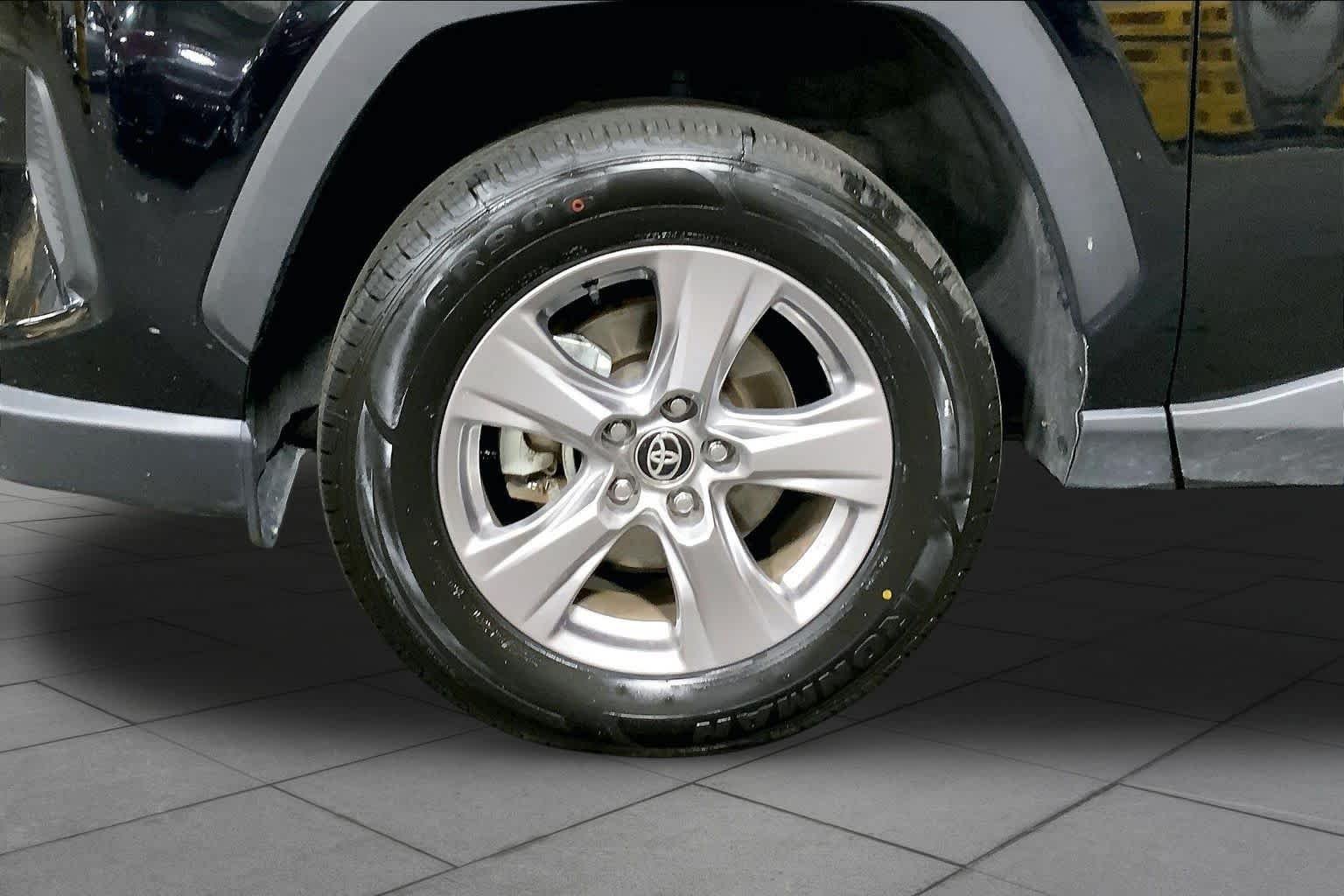 Used 2025 Midnight Black Metallic Toyota XLE image 11