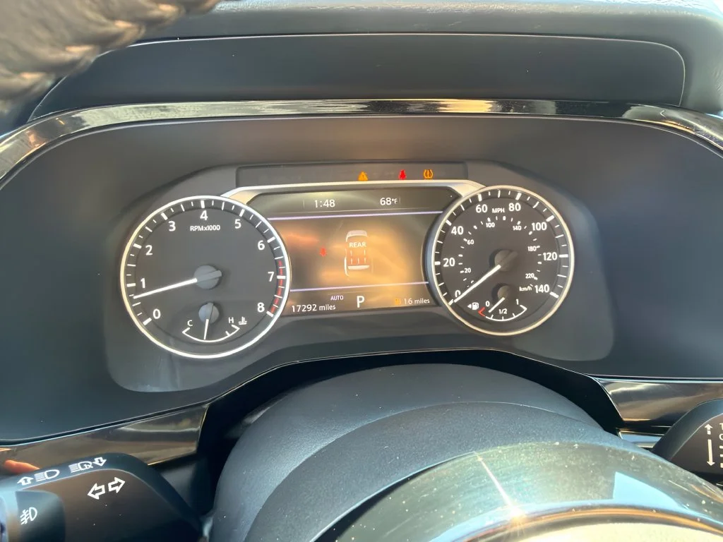 Used 2024 Pearl White Tricoat/Super Black Nissan SL image 20
