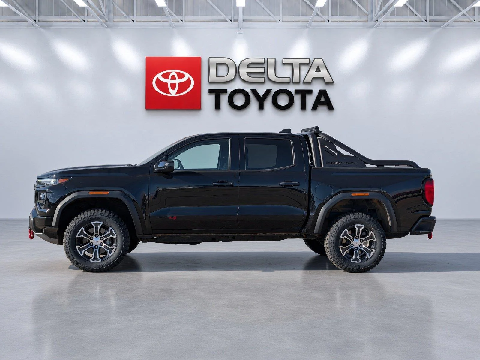 Used 2023 Onyx Black GMC 4WD AT4 image 2