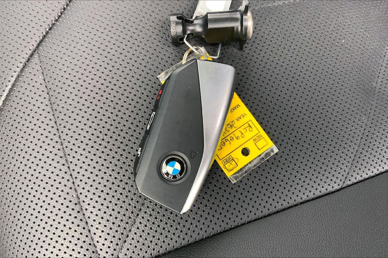 Used 2024 Black Sapphire Metallic BMW xDrive50 image 13