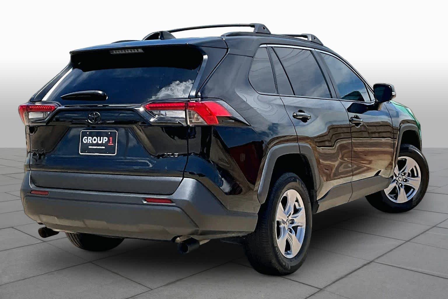 Used 2025 Midnight Black Metallic Toyota XLE image 13