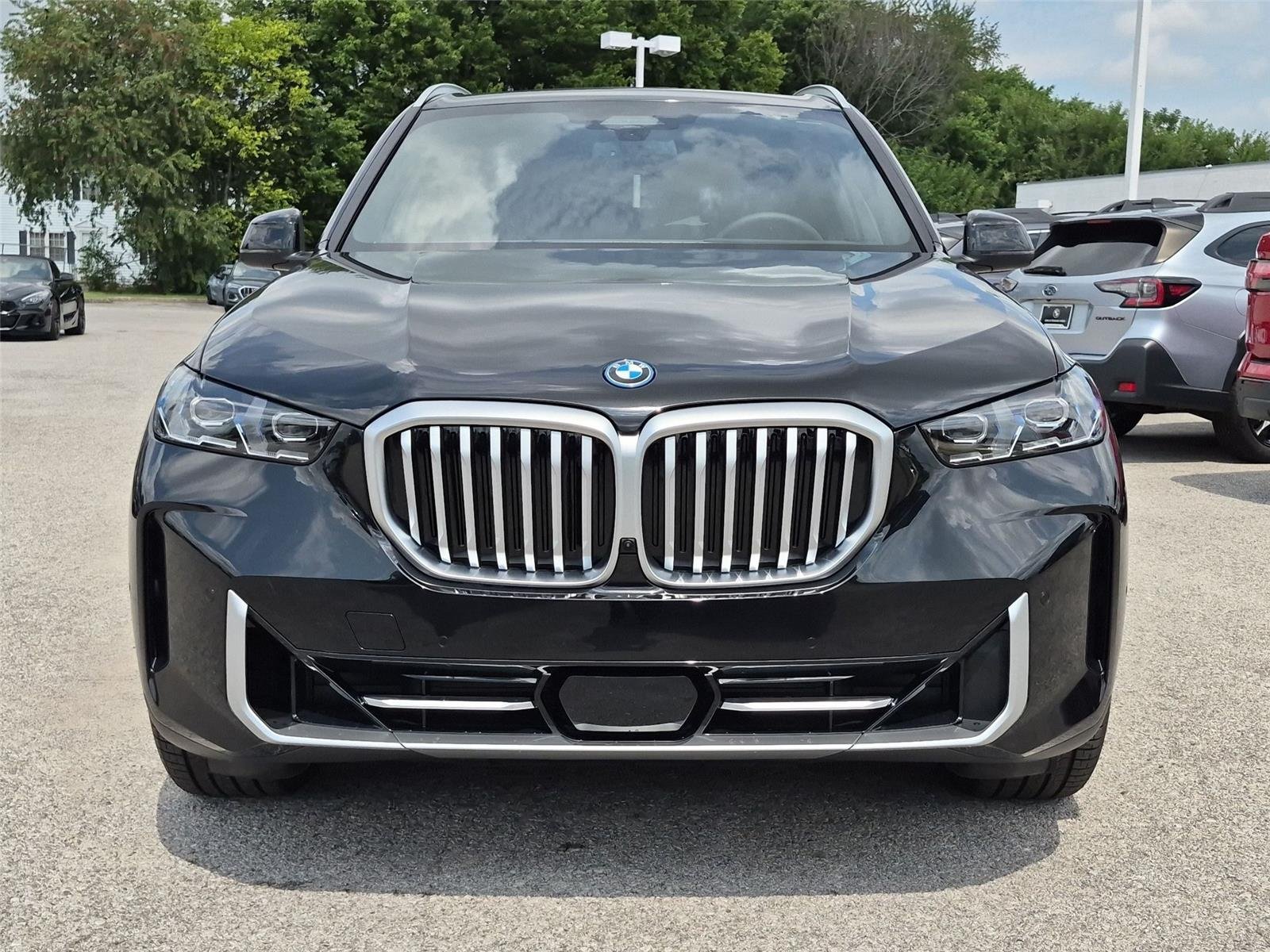 New 2026 Black Sapphire Metallic BMW xDrive50e image 8
