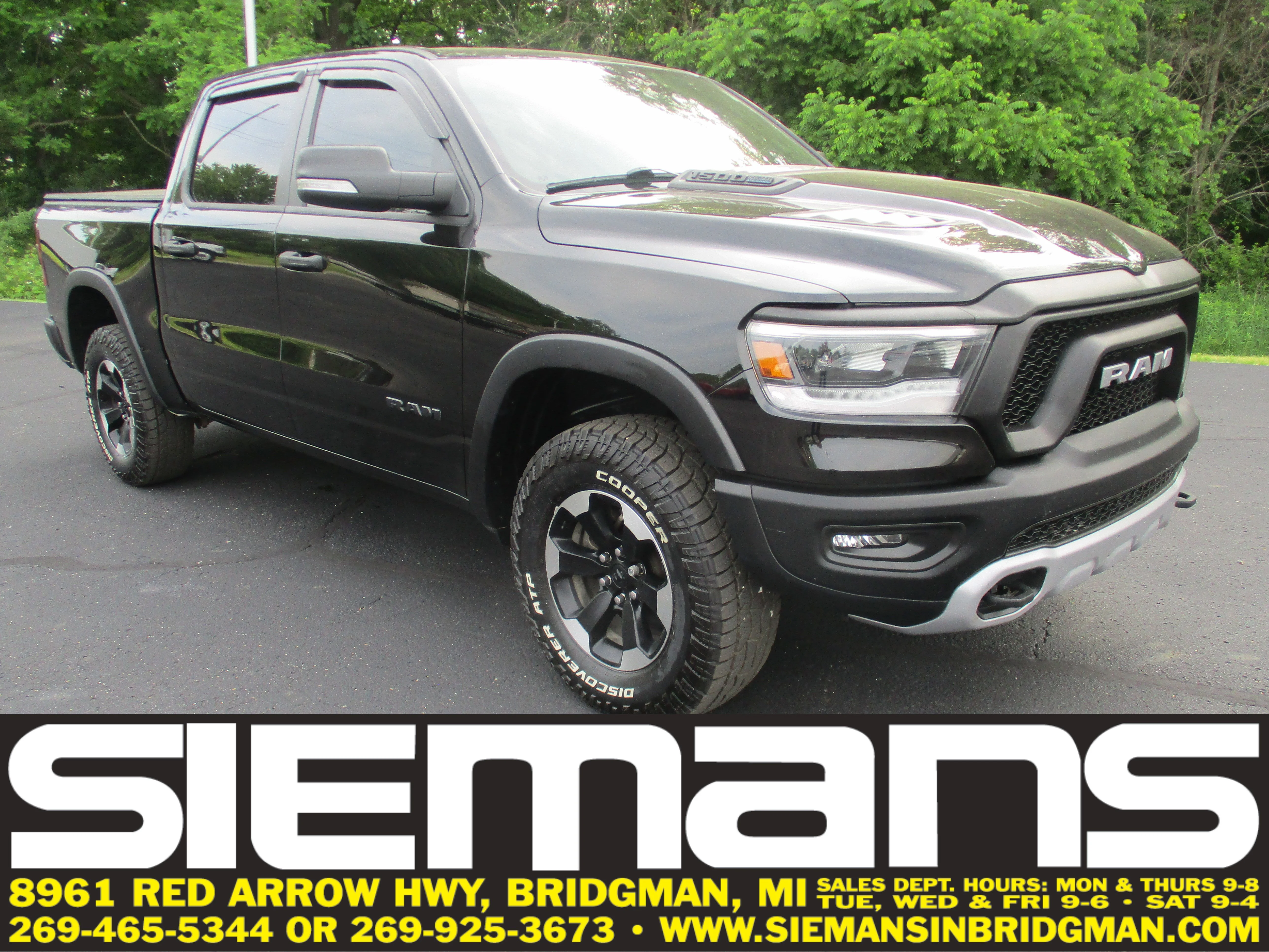 Used 2022 Diamond Black Crystal Pearlcoat Ram Rebel image 1