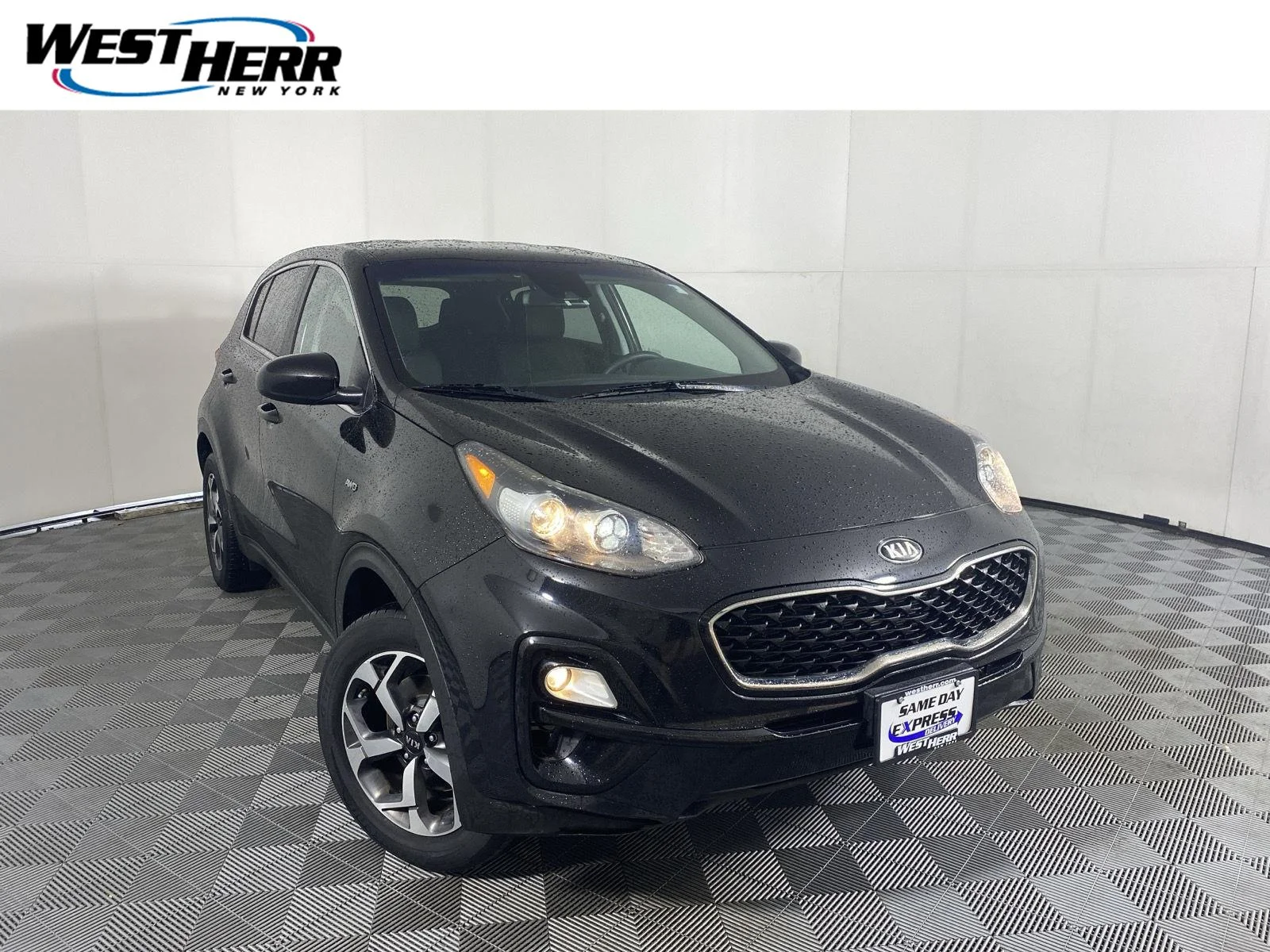Used 2020 Black Cherry Kia LX image 1