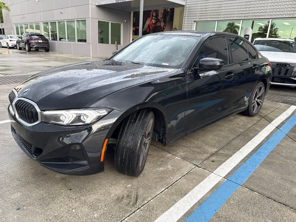 Used 2023 Black BMW 330i image 1