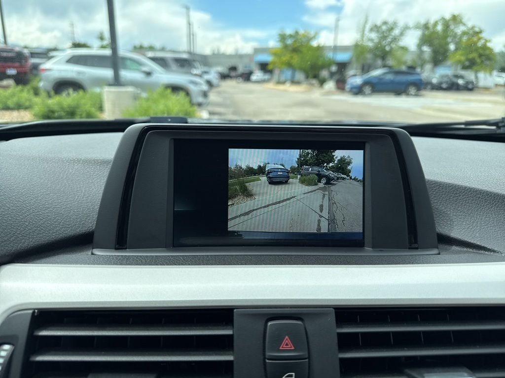 Used 2018 Black Sapphire Metallic BMW 320i xDrive image 20