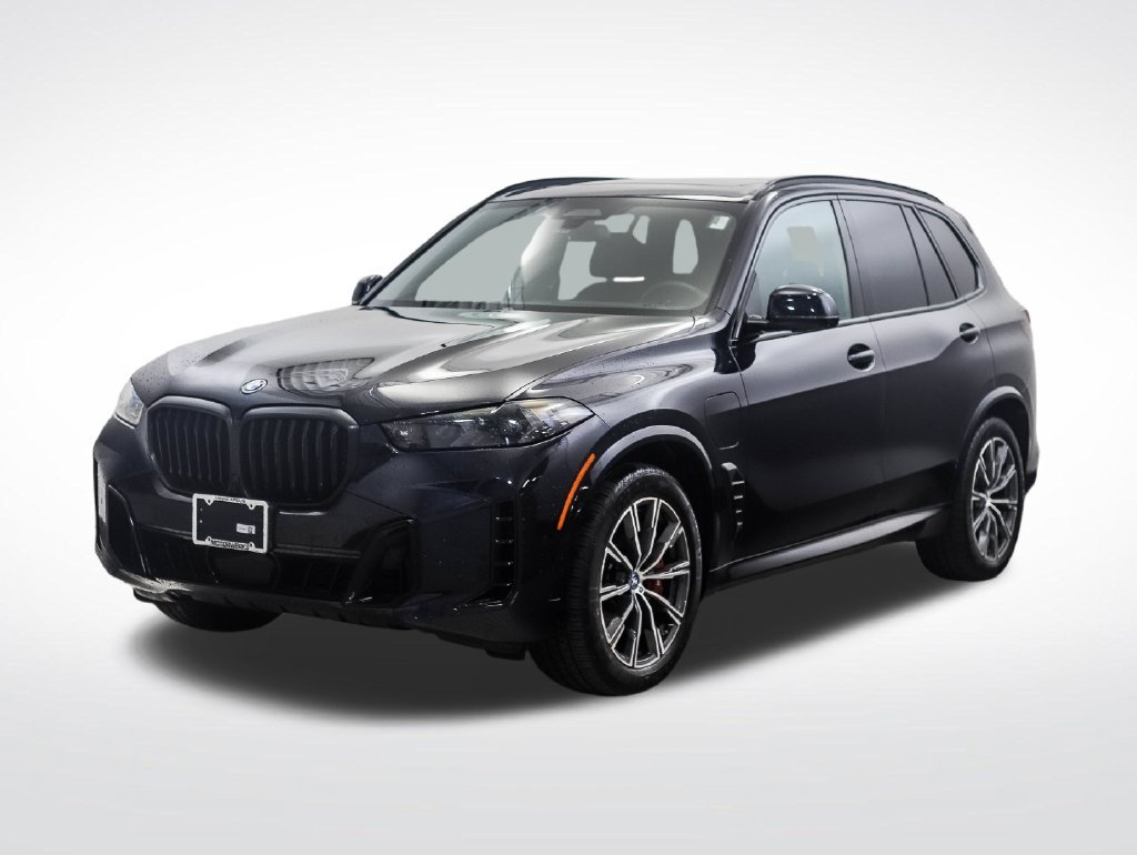 Certified Used 2025 Carbon Black Metallic BMW xDrive50e image 1