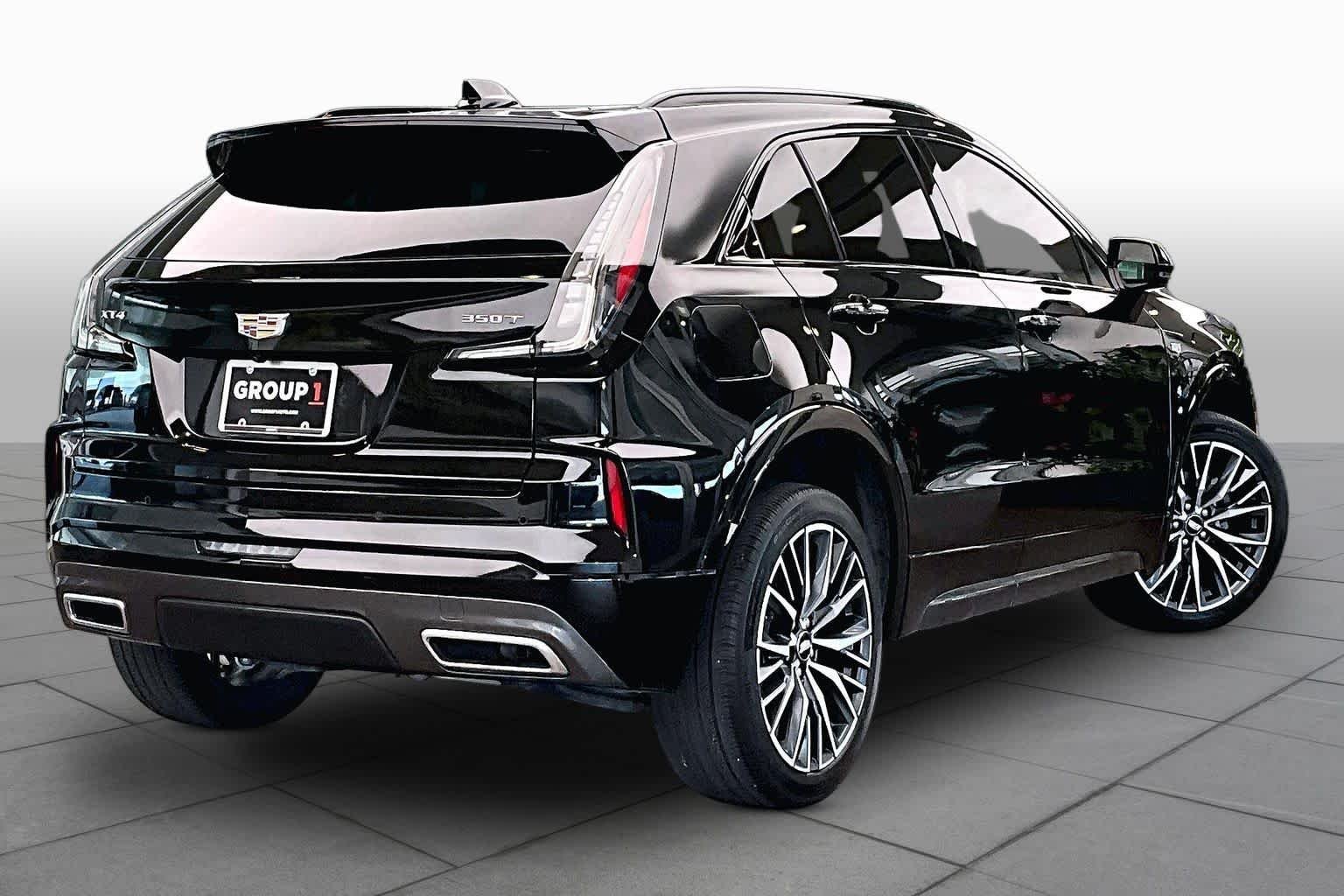 Used 2024 Stellar Black Metallic Cadillac FWD Sport image 13