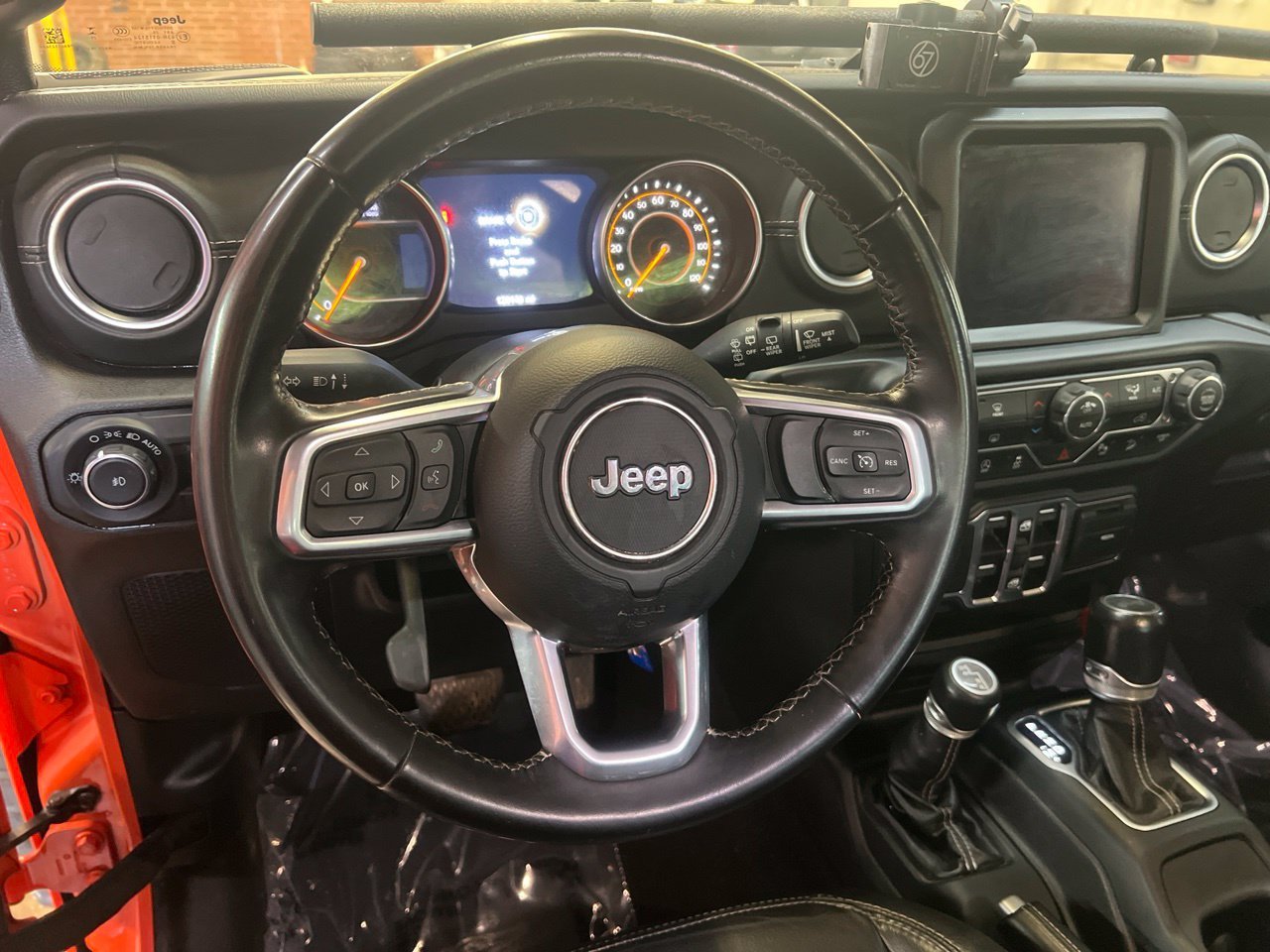 Used 2020 Orange Jeep Unlimited Sahara image 23