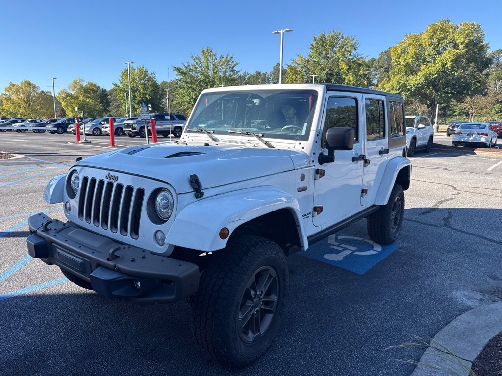 Used 2017 White Jeep Unlimited Sahara image 4